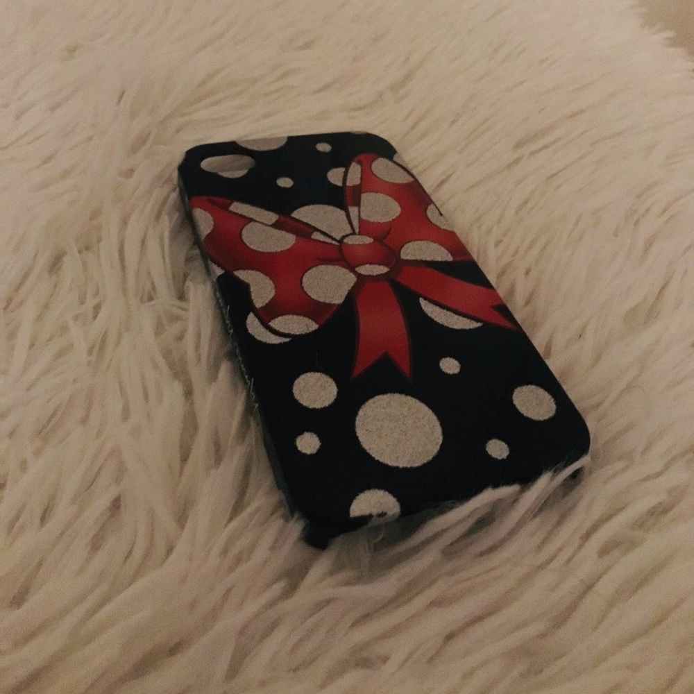 This is a Minnie Mouse style Disney brand Apple IPhone 5 case.